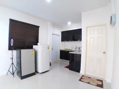 House for rent East Pattaya showing the kitchen and house bathroom 