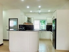 House for rent Mabprachan Pattaya showing the kitchen and guest bathroom