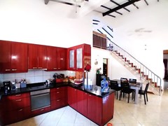 House for rent Mabprachan Pattaya showing the kitchen and dining areas 