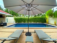 House for rent Mabprachan Pattaya showing the poolside terrace 