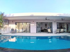 House for rent Pattaya showing the master bedroom poolside 