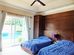 House for rent Nongplalai Pattaya showing the guest bedroom pool view 