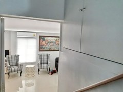 House for sale East Pattaya showing the built-in cabinet and living area 
