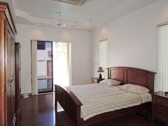 House for sale East Pattaya showing the master bedroom poolside
