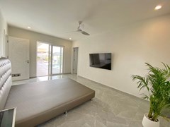 House for sale East Pattaya showing the master bedroom with pool view 