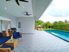 House for sale East Pattaya showing the poolside terrace and utility room 