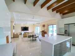 House for sale Mabprachan Pattaya showing the kitchen, dining and living areas   