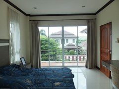 House for sale Na Jomtien Pattaya showing the second bedroom and balcony 
