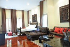 House for sale at Na Jomtien showing the master bedroom with living area