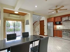House for sale Pattaya Mabprachan showing the dining, kitchen and storeroom 