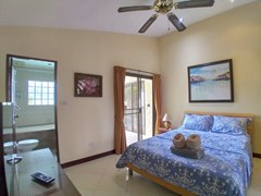 House for sale Pattaya showing the master bedroom suite 