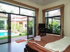 House for sale Pattaya showing the third bedroom poolside