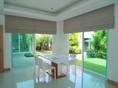House for sale The Vineyard Pattaya showing the dining area with garden view 