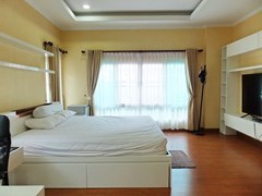 House for sale WongAmat Pattaya showing the master bedroom with bedroom furniture 