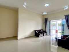 House for sale at Nongplalai Pattaya showing the living area and entrance 