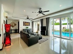 House for sale East Pattaya showing the living room with pool view 