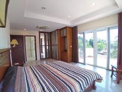 House for sale East Pattaya showing the master bedroom suite 