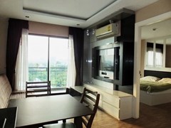 Condominium for rent East Pattaya showing the living, dining and sleeping areas 