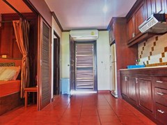Condominium for rent Jomtien showing the kitchen and entrance 