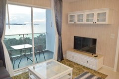 Condominium for rent Pratumnak Pattaya showing the living area and balcony view 