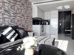 Condominium for rent on Pratumnak Hill showing the living and kitchen areas 