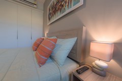 Condominium for rent UNIXX South Pattaya showing the bedroom with built-in wardrobes