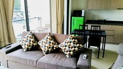 Condominium for rent UNIXX South Pattaya showing the living, dining, balcony and kitchen 