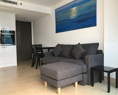 Condominium for rent Pattaya showing the living and dining areas 