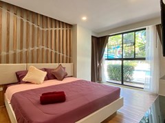 Condominium for Rent Jomtien showing the master bedroom with pool view 