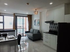Condominium for Rent Pattaya showing the living, dining and kitchen areas 
