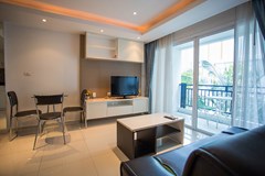 Condominium for rent Pattaya showing the living room and balcony 