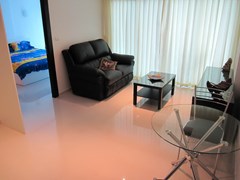 Condominium for rent Pattaya showing the living room and bedroom