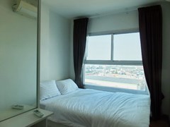 Condominium for Rent Pattaya showing the bedroom and view 
