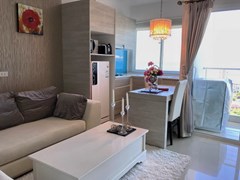 Condominium for Rent Wongamat Pattaya  showing the living, dining and kitchen areas 