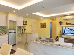 Condominium for sale Jomtien Pattaya showing the living room and entrance 