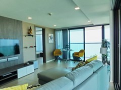 Condominium for sale Na Jomtien showing the living and dining areas 