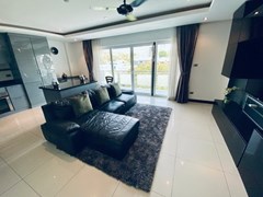 Condominium for sale Pratumnak Pattaya showing the living room and balcony 