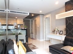 Condominium for rent Central Pattaya showing the living, dining and kitchen areas 