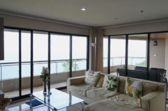 Condominium for sale Pratumnak Pattaya showing the living room with balcony access