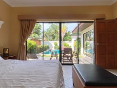 House for rent View Talay Villas Jomtien showing the bedroom with pool view 