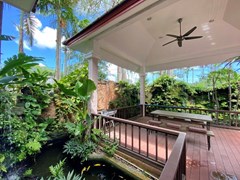 House for rent showing the covered terrace and fishes pond 