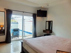 House for rent East Pattaya showing the master bedroom pool view 