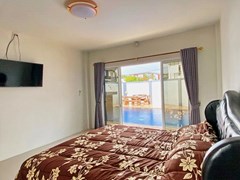 House for rent East Pattaya showing the master bedroom pool view 