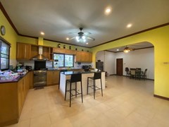 House for rent Mabprachan Pattaya showing the kitchen and dining areas 