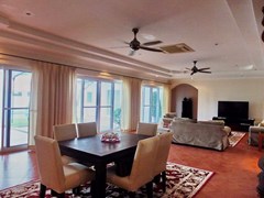 House for rent East Pattaya showing the  dining and living areas with pool view 