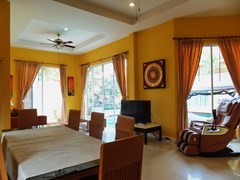 House for sale East Pattaya showing the dining area and pool view 