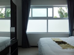 House for sale Jomtien showing the second bedroom with built-in-wardrobes 