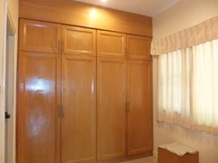 House for Sale Mabprachan Pattaya showing the master bedroom walk-in wardrobes 