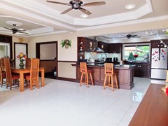 House For Sale Nongpalai Pattaya showing the dining and kitchen areas 