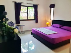House For sale East Pattaya showing the master bedroom suite 